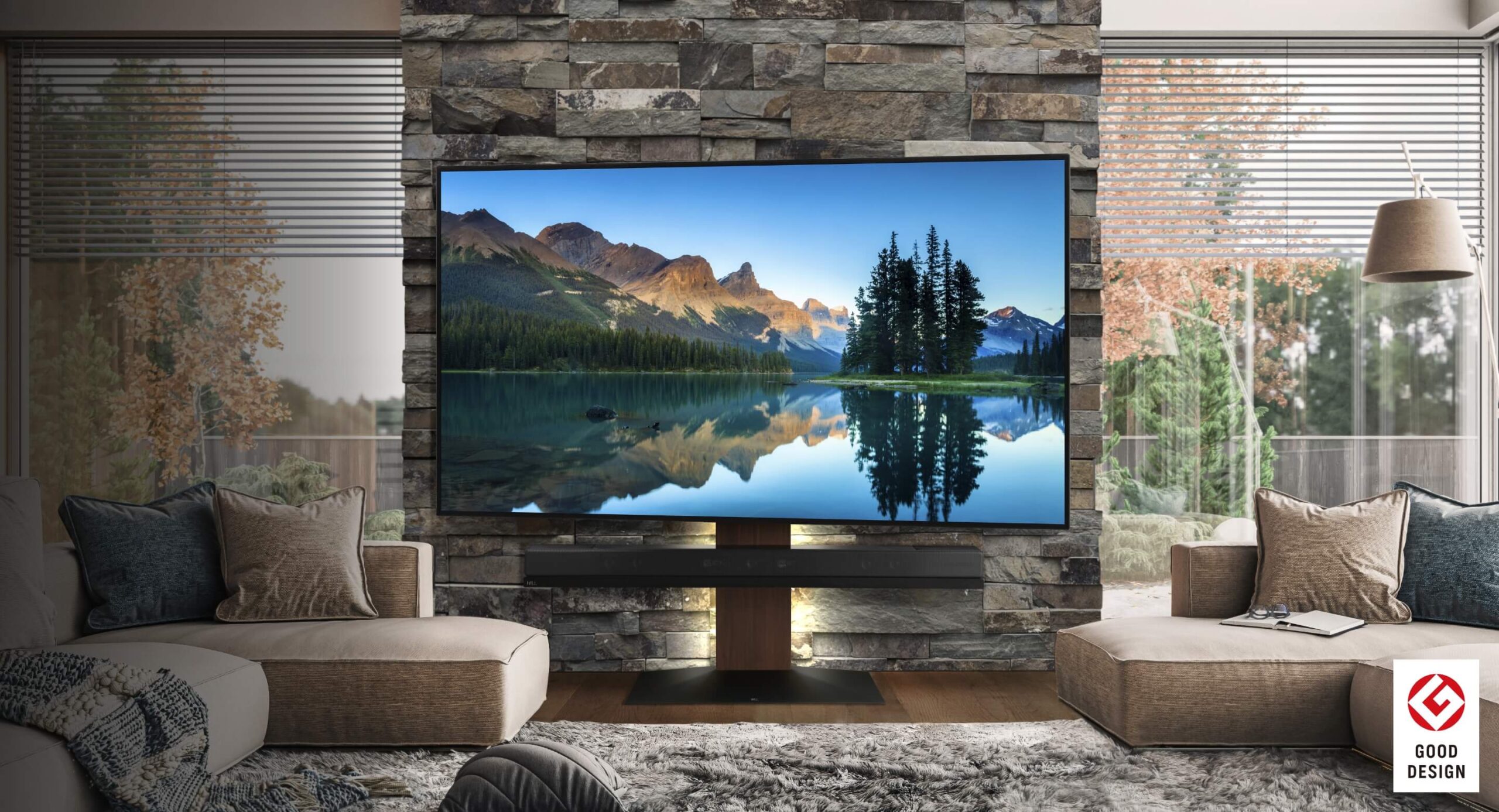 EQUALS WALL V3を使い、テレビもサウンドバーも壁掛け風に設置され、配線がスタンドの支柱内に隠蔽されている写真